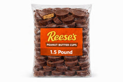 Tundras ReeseMilk unwrapped peanut butter cups shown in bulk packaging, convenient for gifting and baking.