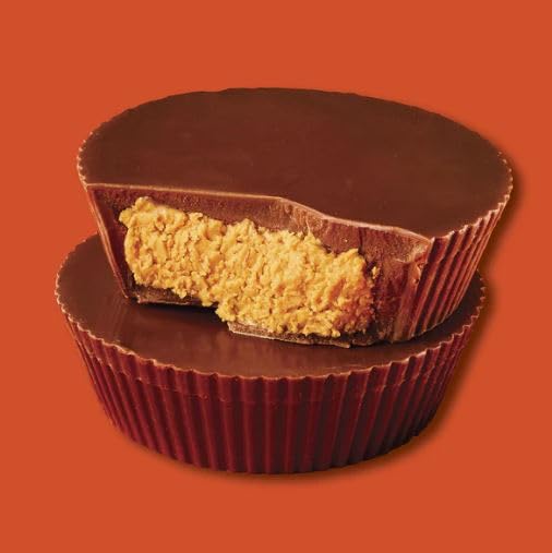 Tundras ReeseMilk rich chocolate coating on bite-sized cups, indulgent texture.