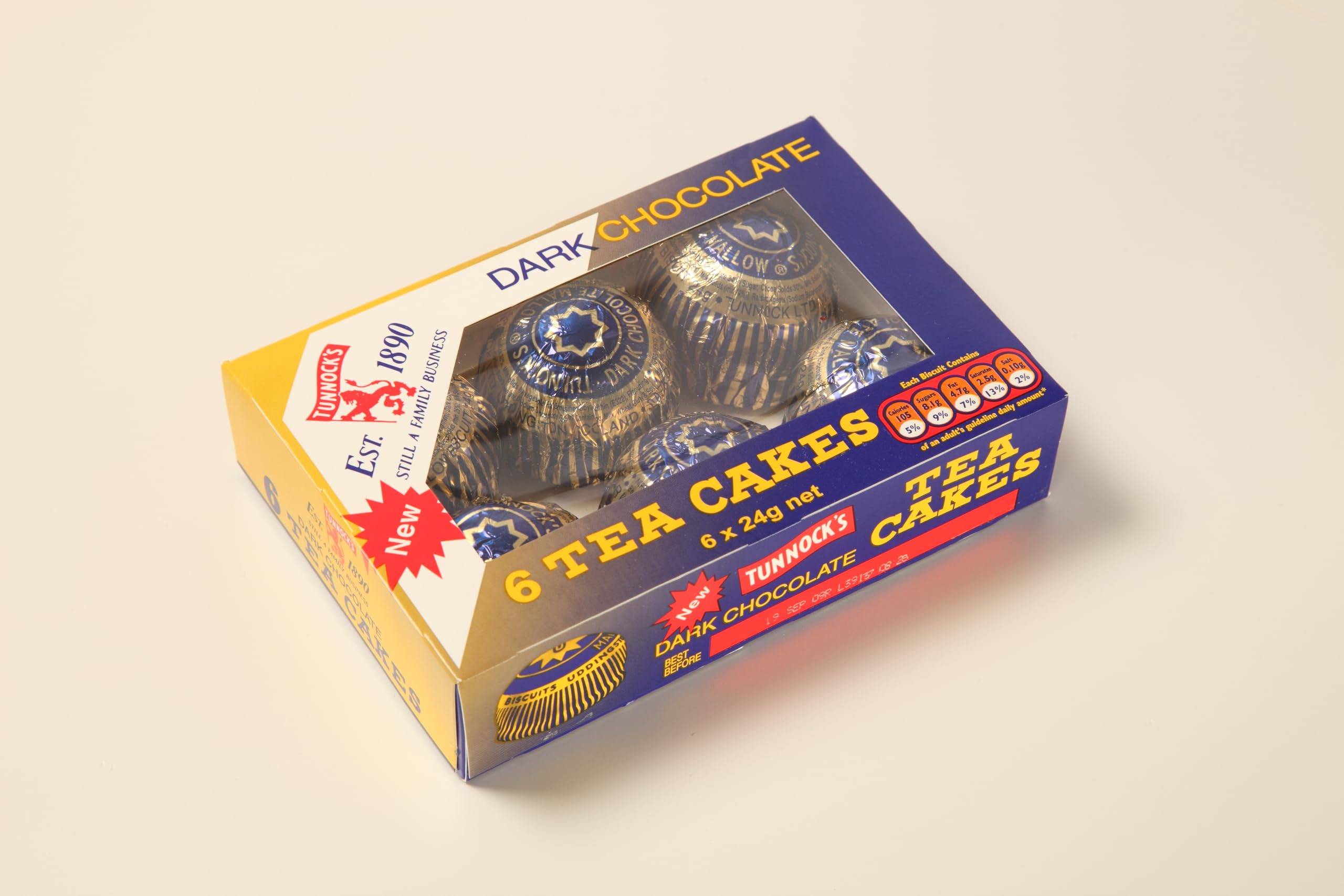 Tunnock's Tea Cakes marshmallow close-up, showcasing fluffy center and glossy coating.