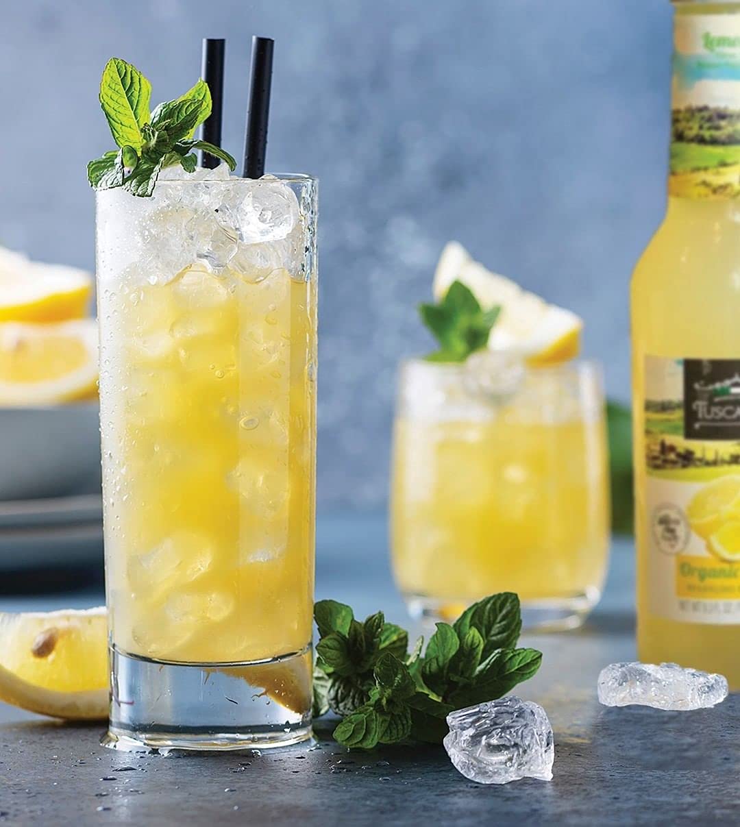 Tuscanini hand-picked lemons harvest scene emphasizing premium fruits.