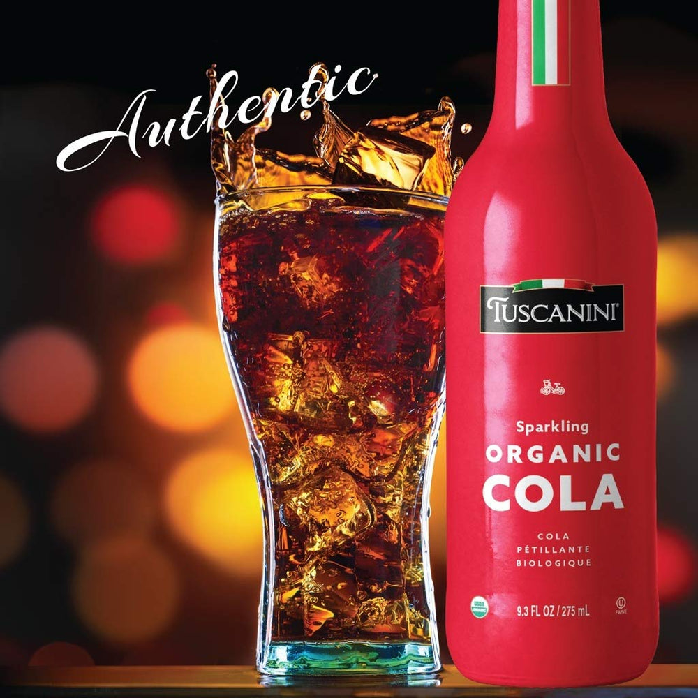 Pouring Tuscanini Organic Cola into a glass, refreshing aroma rises
