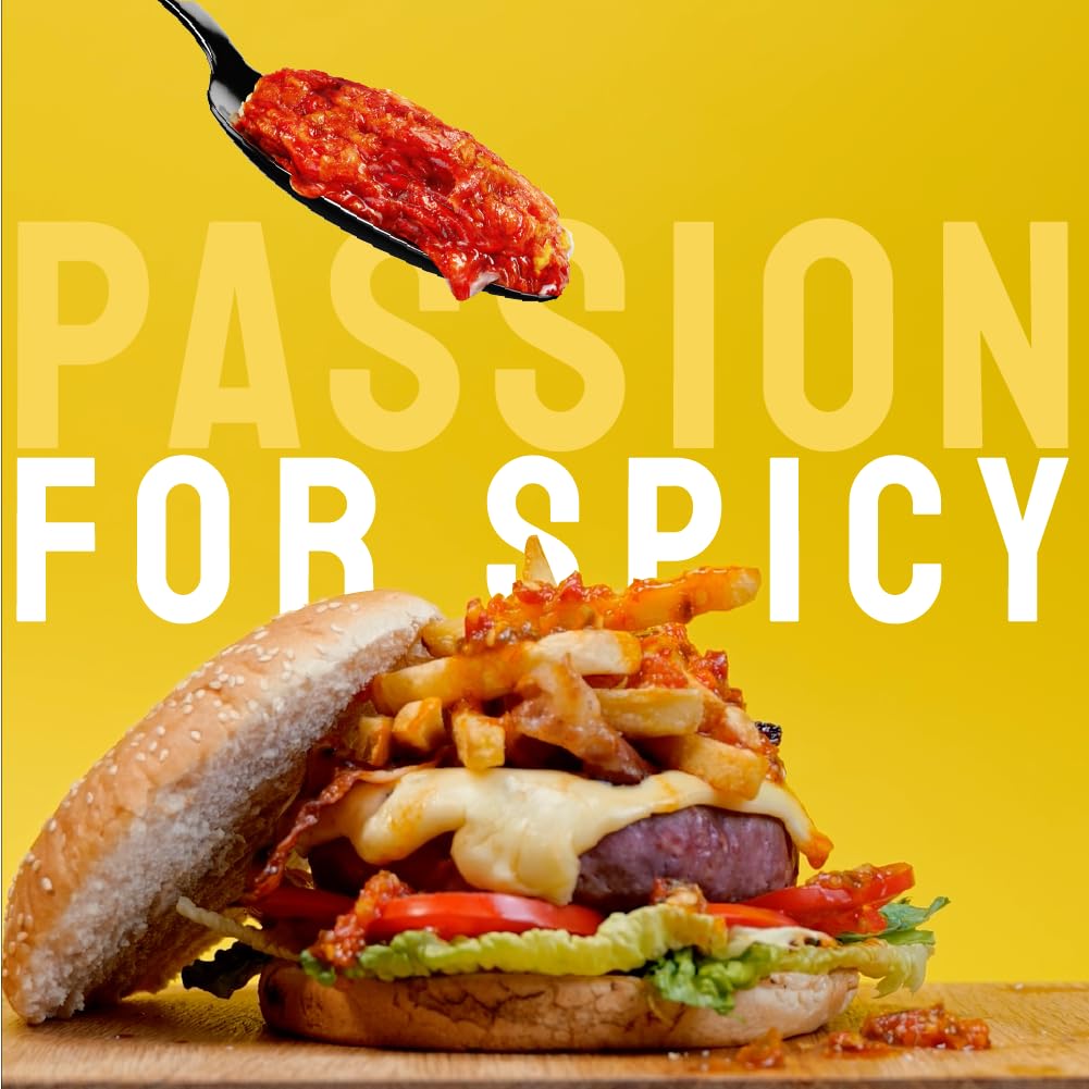 Chili flakes sprinkled into dressing to enhance depth and aroma
