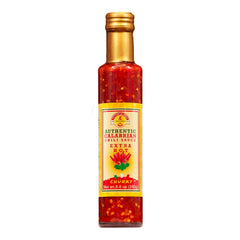 TUTTOCALABRIA chunky hot sauce bottle highlighting bold Calabrian peppers for rich flavor