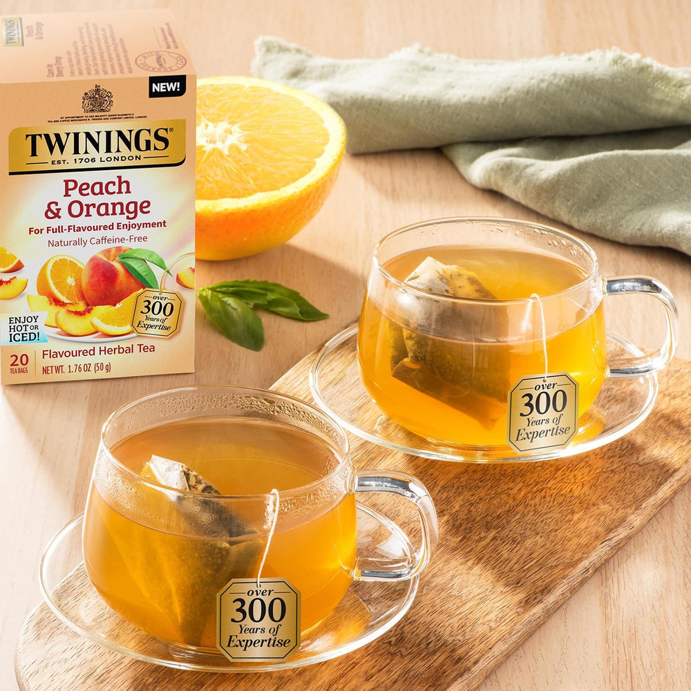 Twinings tea brewing in hot water for 3–4 minutes