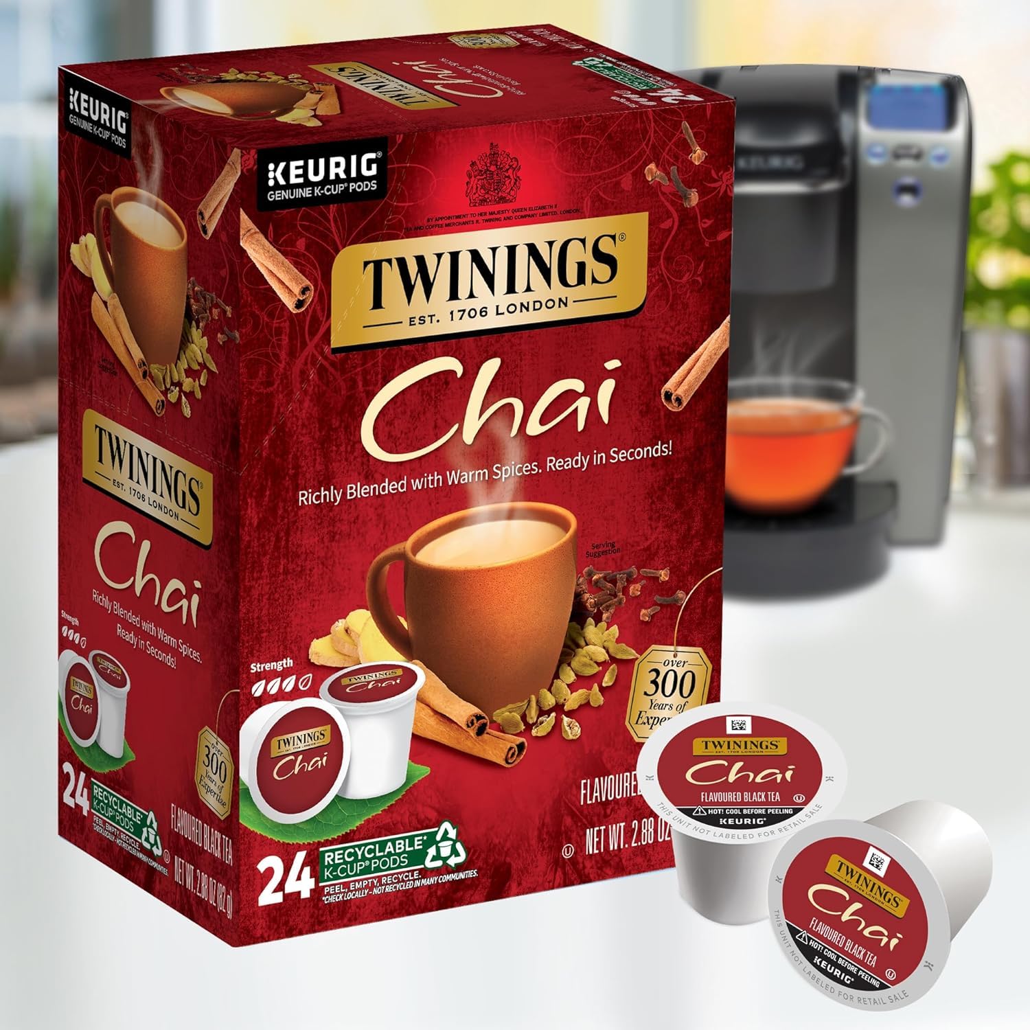 Twinings chai spice blend close-up with cinnamon, cardamom, cloves, ginger.