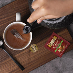 Steaming cup of Twinings Chai tea inviting cozy breaks.