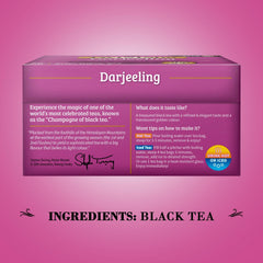 Cup of Twinings Darjeeling steeping with a light-bodied, woody note