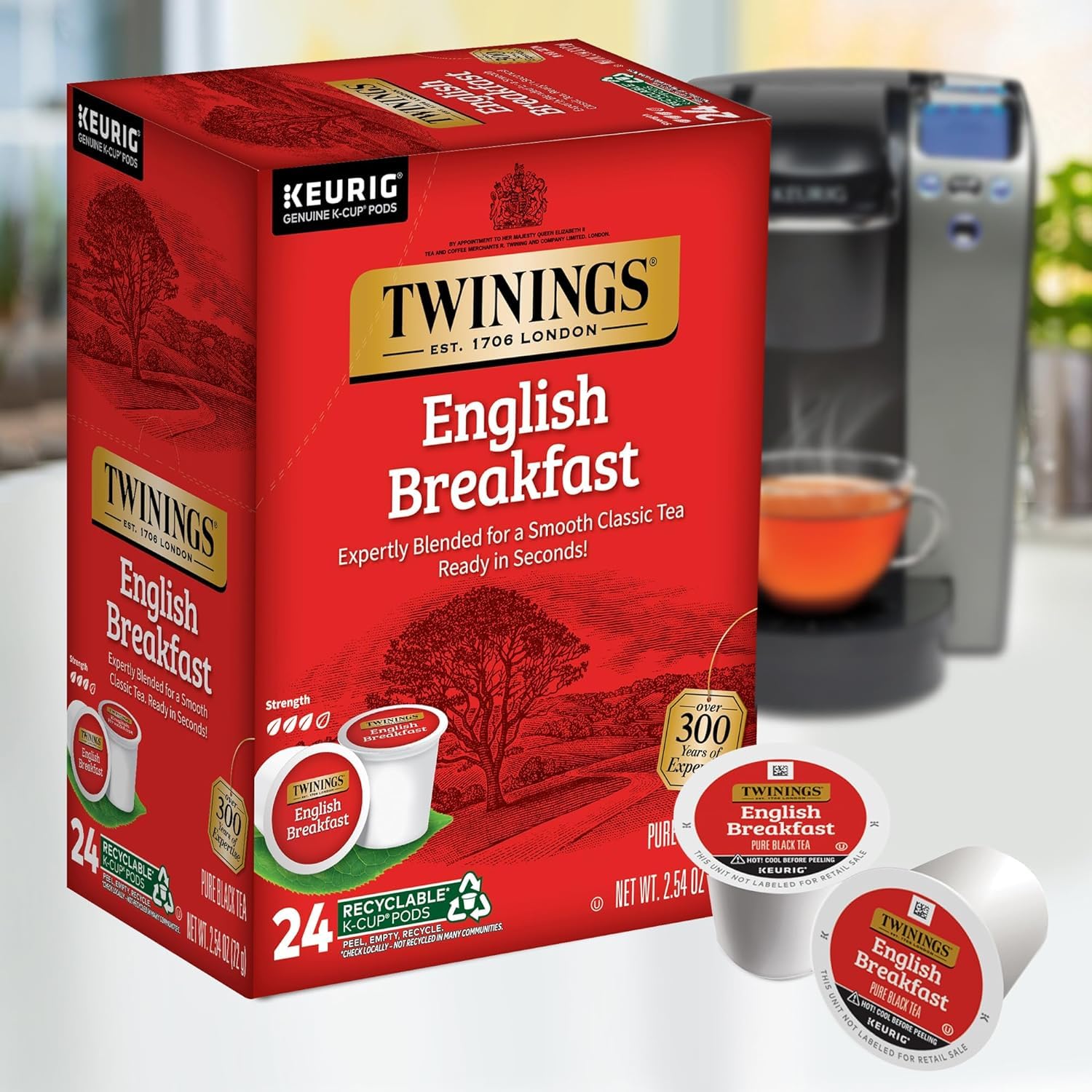 Twinings English Breakfast packaging close-up highlighting responsible sourcing and quality.