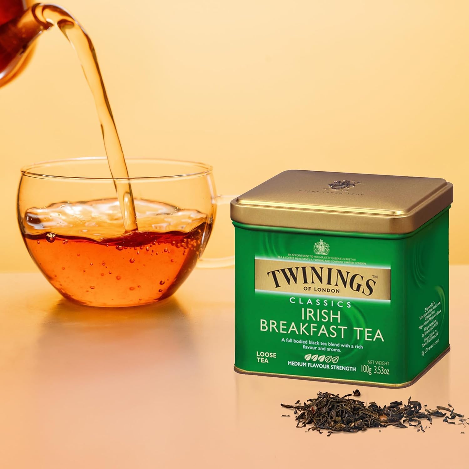 Twinings Irish Breakfast brew pour releasing a rich aroma for a robust cup.
