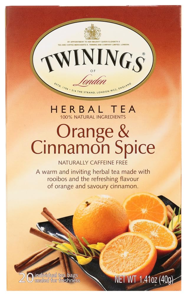 Twinings Orange and Cinnamon Spice Tea box with orange zest and cinnamon, ideal for cozy mornings.