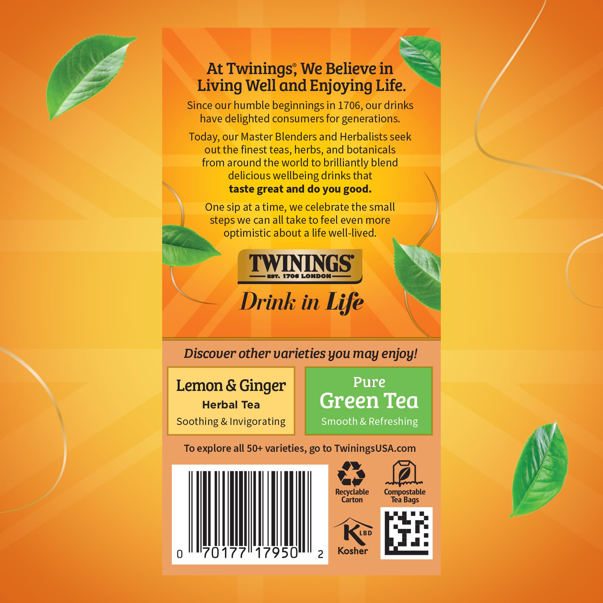 Fresh orange peels and cinnamon sticks beside Twinings tea setup