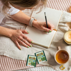Brewing Twinings Peppermint Tea in a cup releases a cooling aroma.
