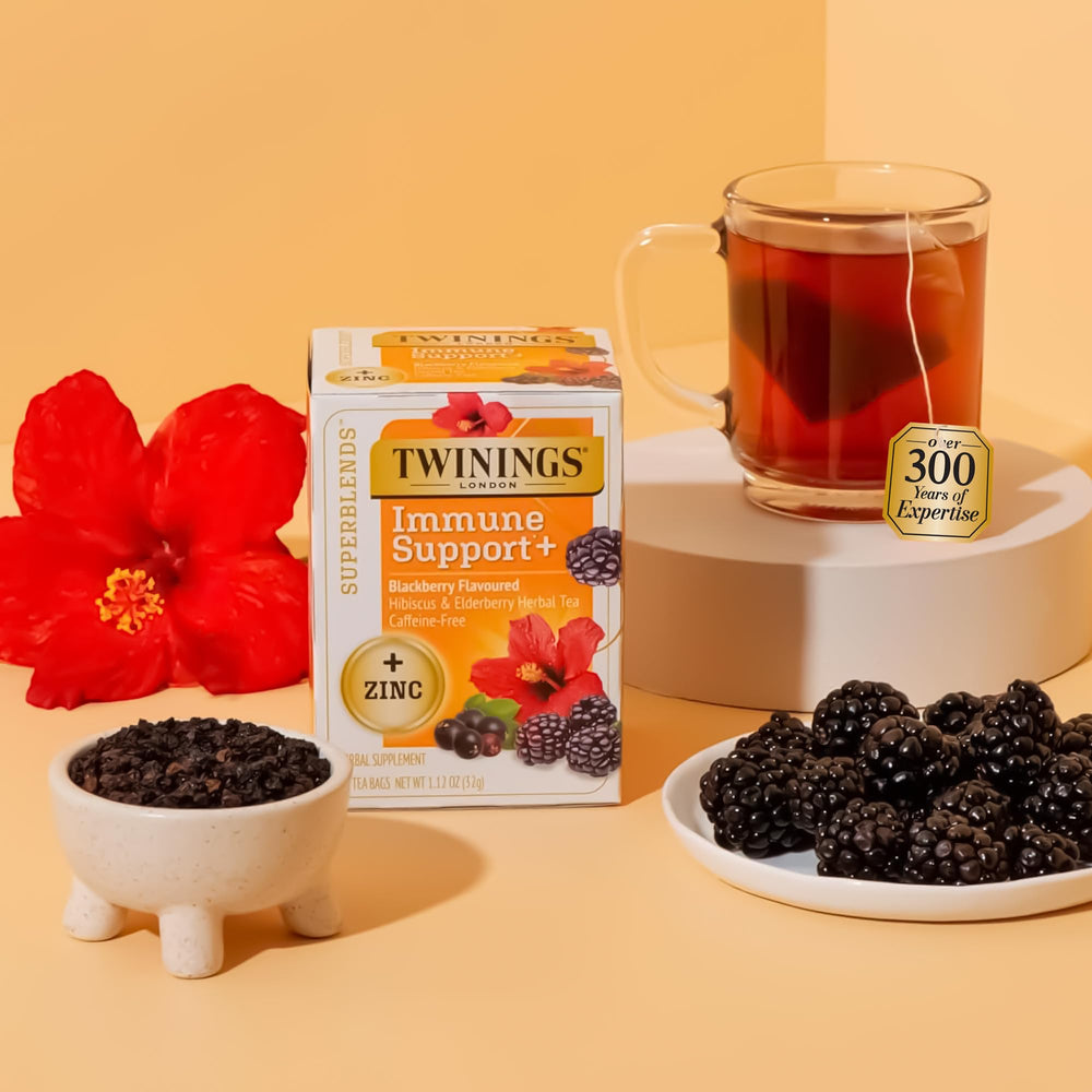 Twinings hibiscus elderberry tea bags closeup with vibrant color and notes