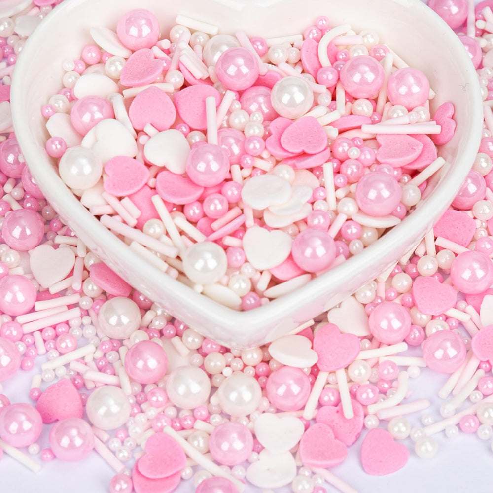 Twisweet pink pearl heart sprinkles on cake for elegant decoration