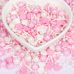 Twisweet pink pearl heart sprinkles on cake for elegant decoration