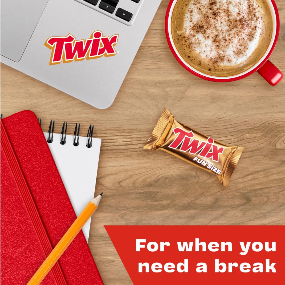 Twix bars paired with coffee for a quick afternoon treat.