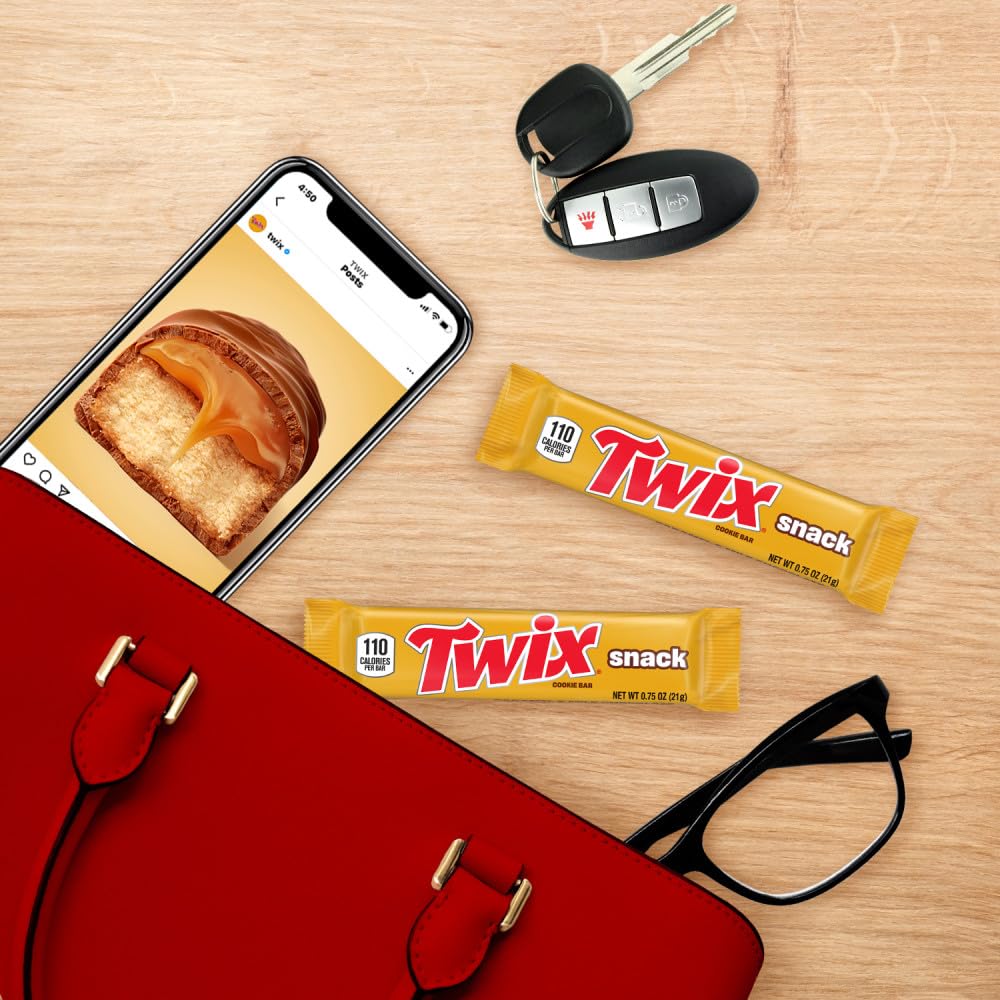 Twix bars in a lunchbox, a convenient afternoon treat.