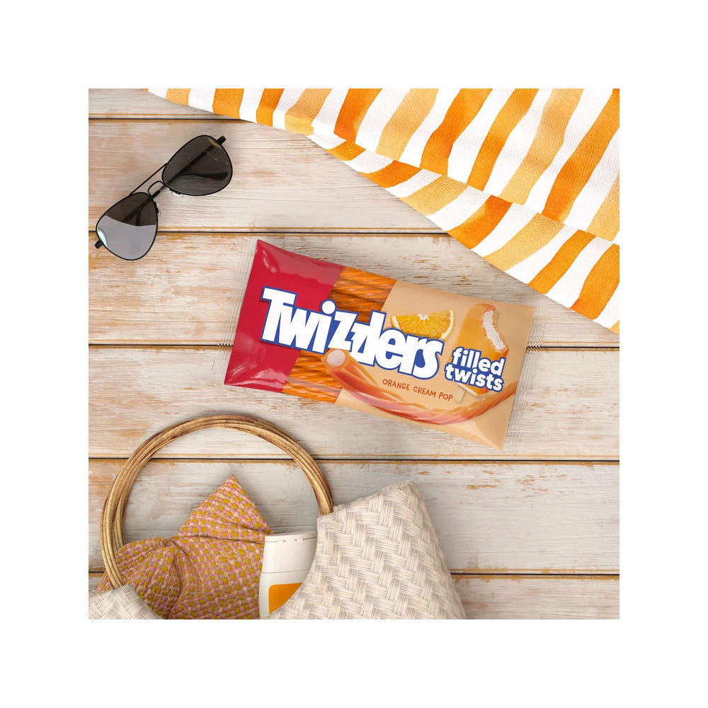 Twizzlers Orange Cream Twists family-snack scene ideal for movie night and gatherings.
