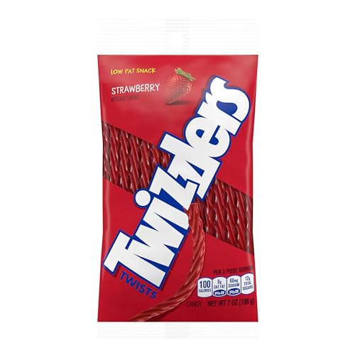 Twizzlers Twists Strawberry being dipped into milk for a playful ritual.