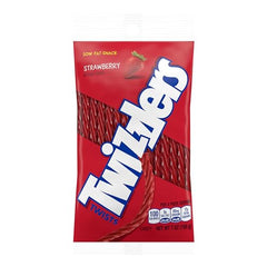 Twizzlers Twists Strawberry being dipped into milk for a playful ritual.