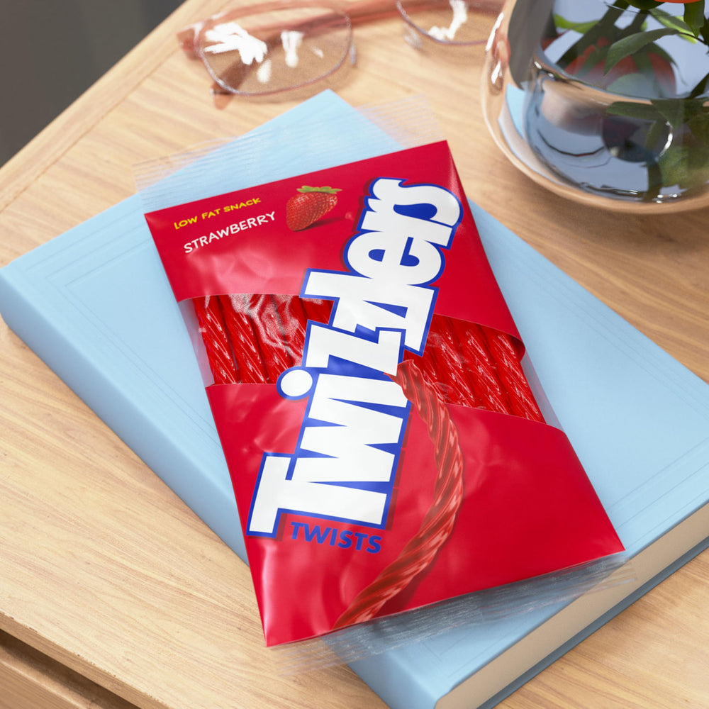 Seasonal display of Twizzlers Twists Strawberry Candy in a festive setting.