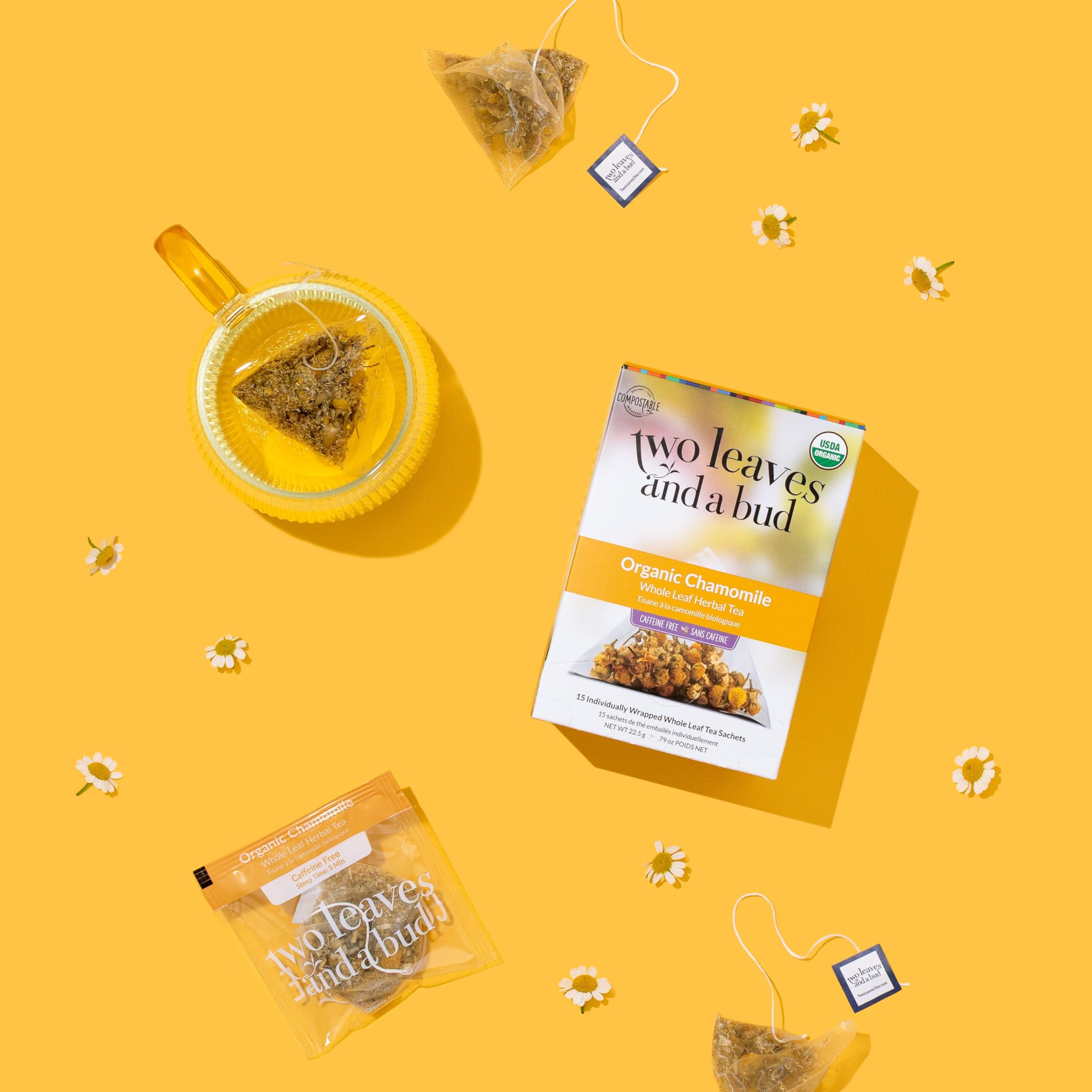 Two Leaves and a Bud compostable tea packaging on a clean surface.