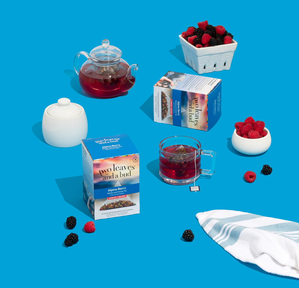 Two Leaves and a Bud hibiscus-berry infusion with a vibrant red hue.
