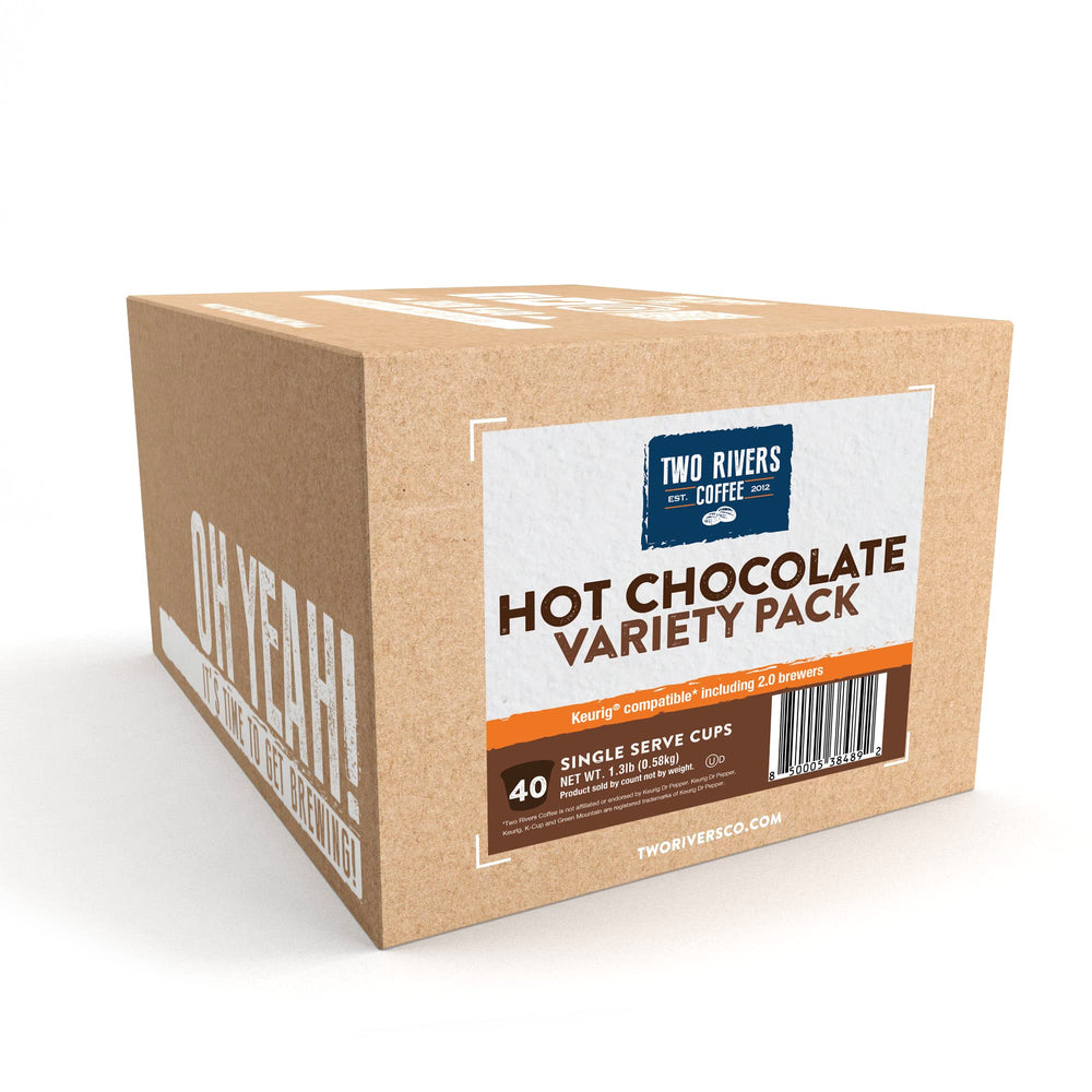 Two Rivers Milk Chocolate hot chocolate pods for creamy flavor.