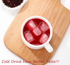 ULTHMOK brewed hibiscus tea in glass emphasizes vivid color and inviting aroma.