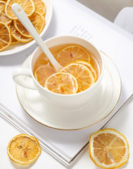 ULTHMOK dried lemon slices on a tea tray for aromatic infusion.