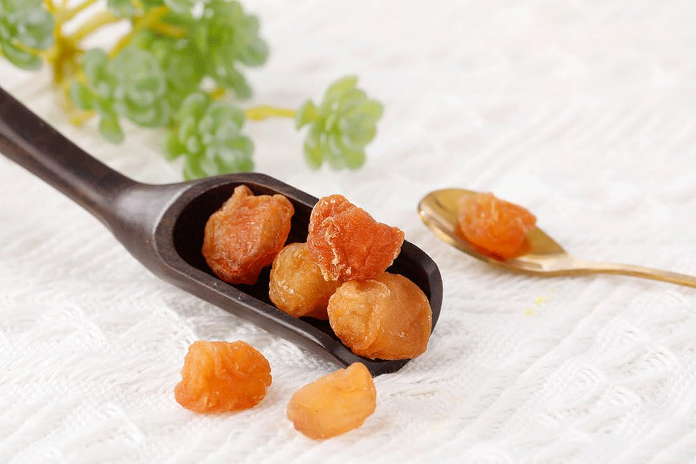 ULTHMOK longan-fruit-packaging-closeup, showcasing harvest quality and no additives.