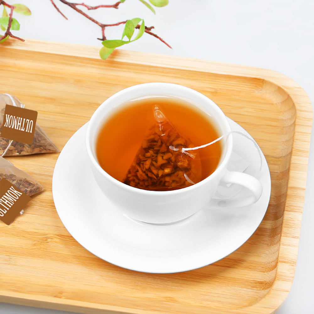 ULTHMOK Burdock tea brewed cup captures earthy aroma and comforting taste.