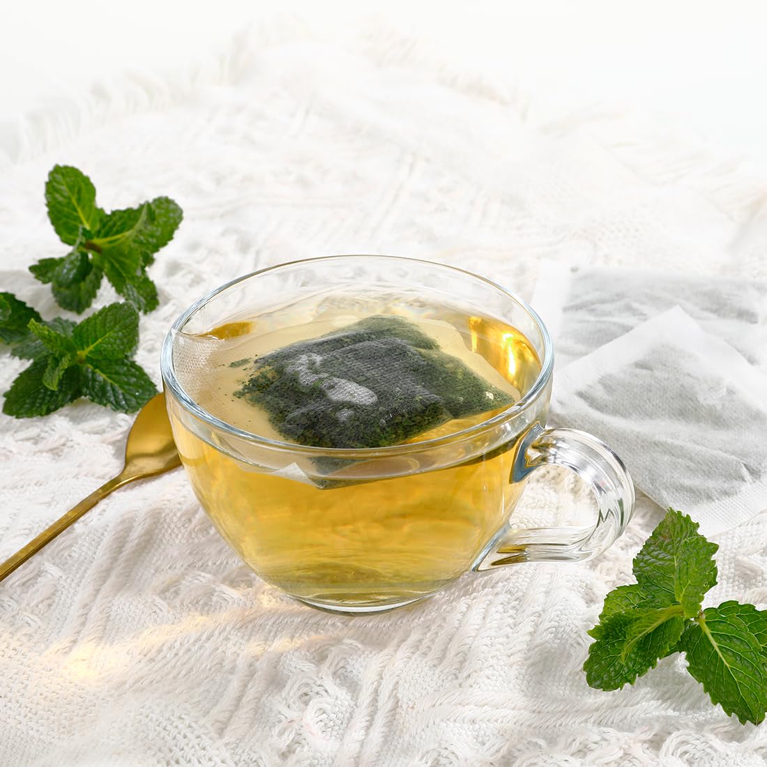 ULTHMOK tea bags pouring into a cup for easy, relaxing steep.