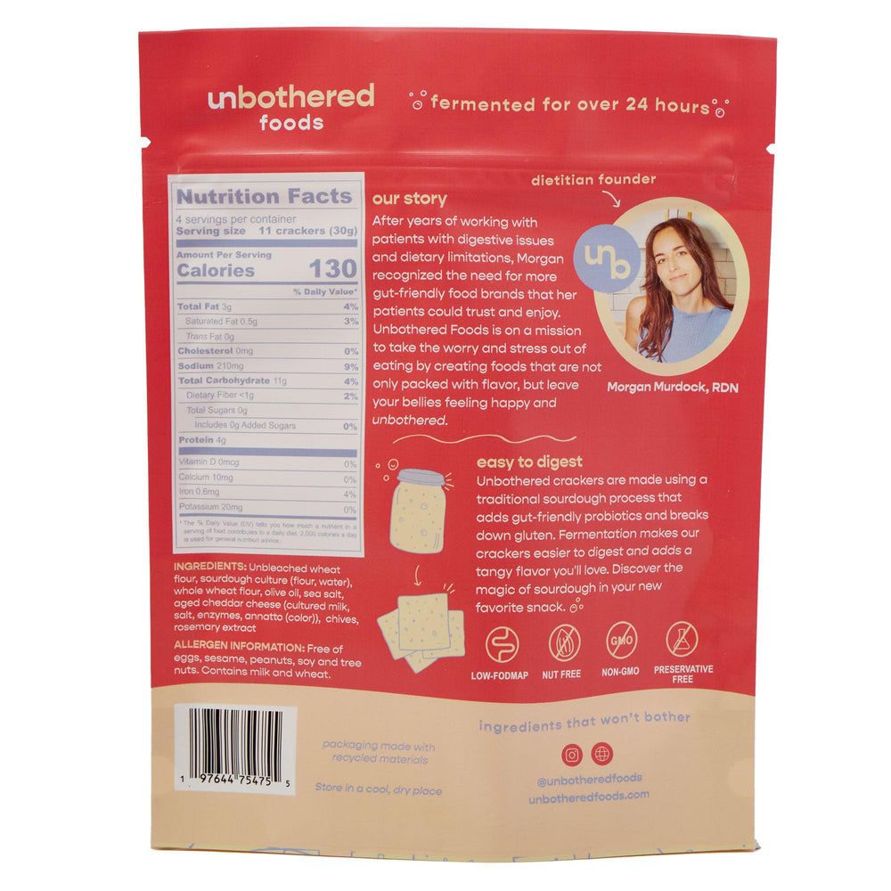 Three-flavor pack of Unbothered Foods sourdough crackers on display.