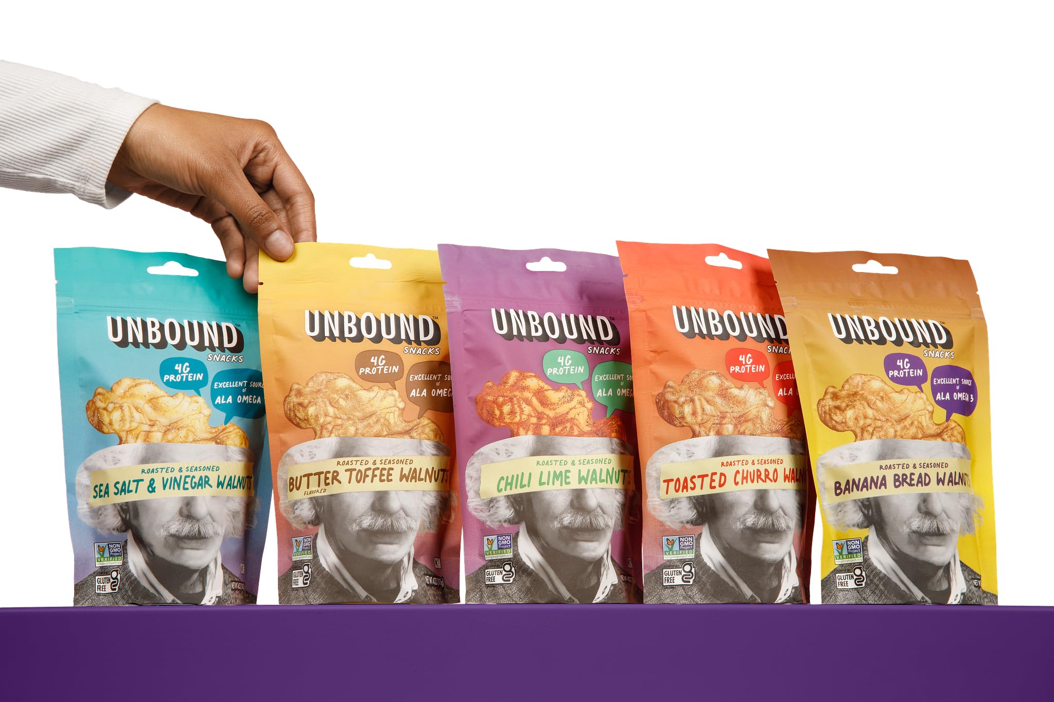 Unbound Snacks walnut flavors display on tray, flavorful protein boost for trails