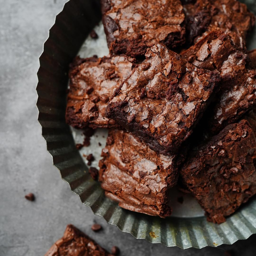Unpretentious Black Cocoa Powder showcased in batter-ready setup for deep chocolate notes.