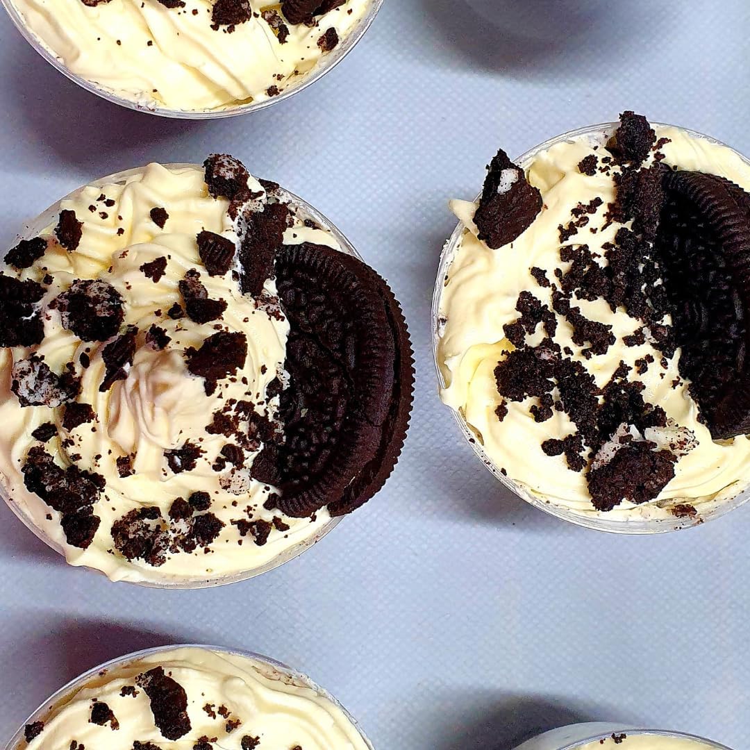 Unpretentious Black Cocoa Powder seen with cake dessert for rich color.