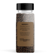 Unpretentious Pepper Mill in use, delivering fresh ground pepper at the table.