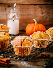 Unpretentious Pumpkin Powder near a baked dish, adding color and aroma to treats.
