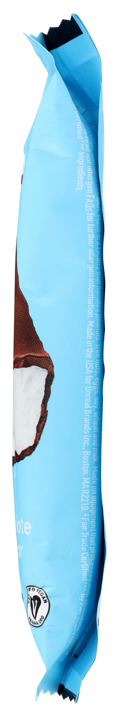 UNREAL choc bar dark coconut on surface suggests portable snacking