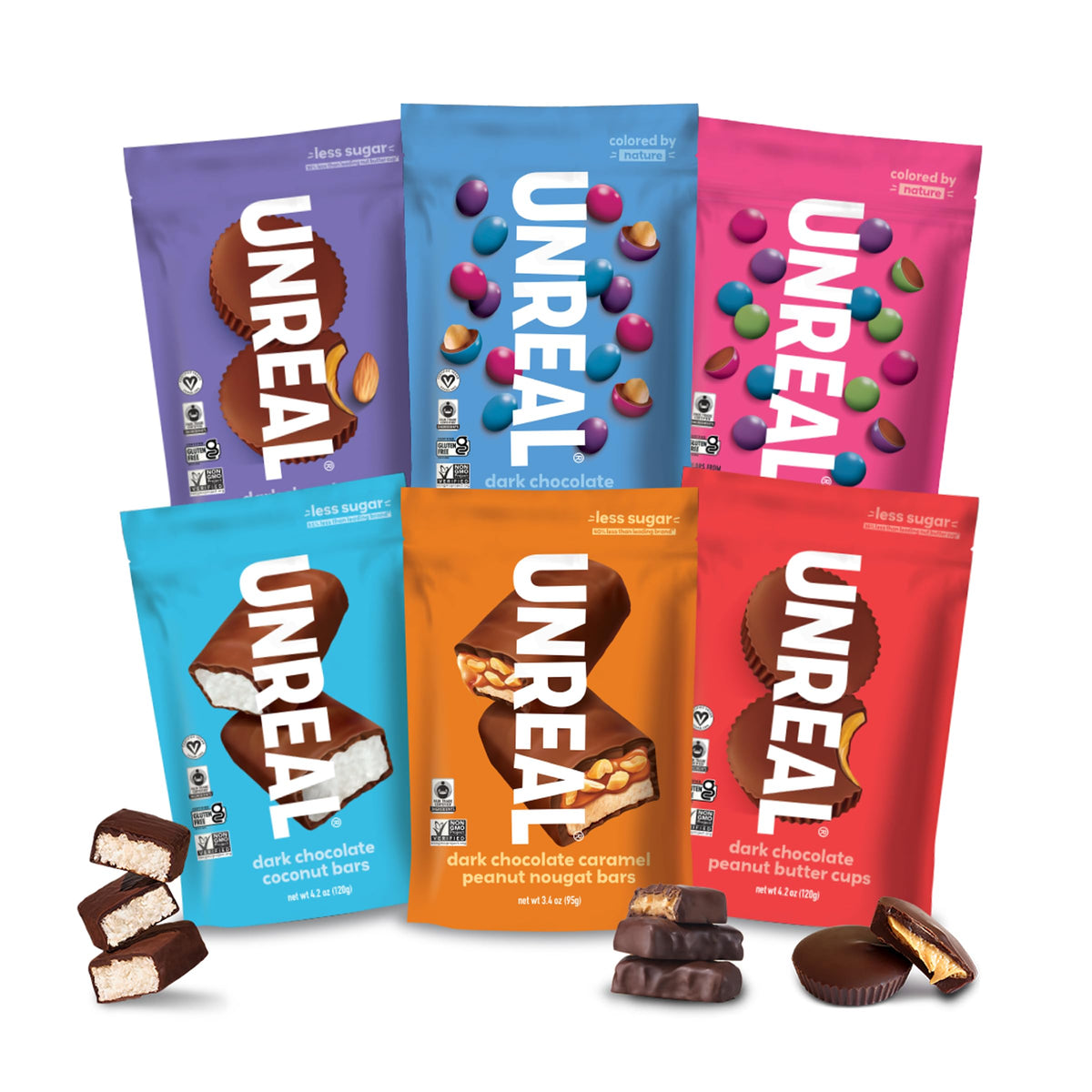 UNREAL Complete Variety Pack peanut butter cups on a colorful counter for energy-friendly snacking.