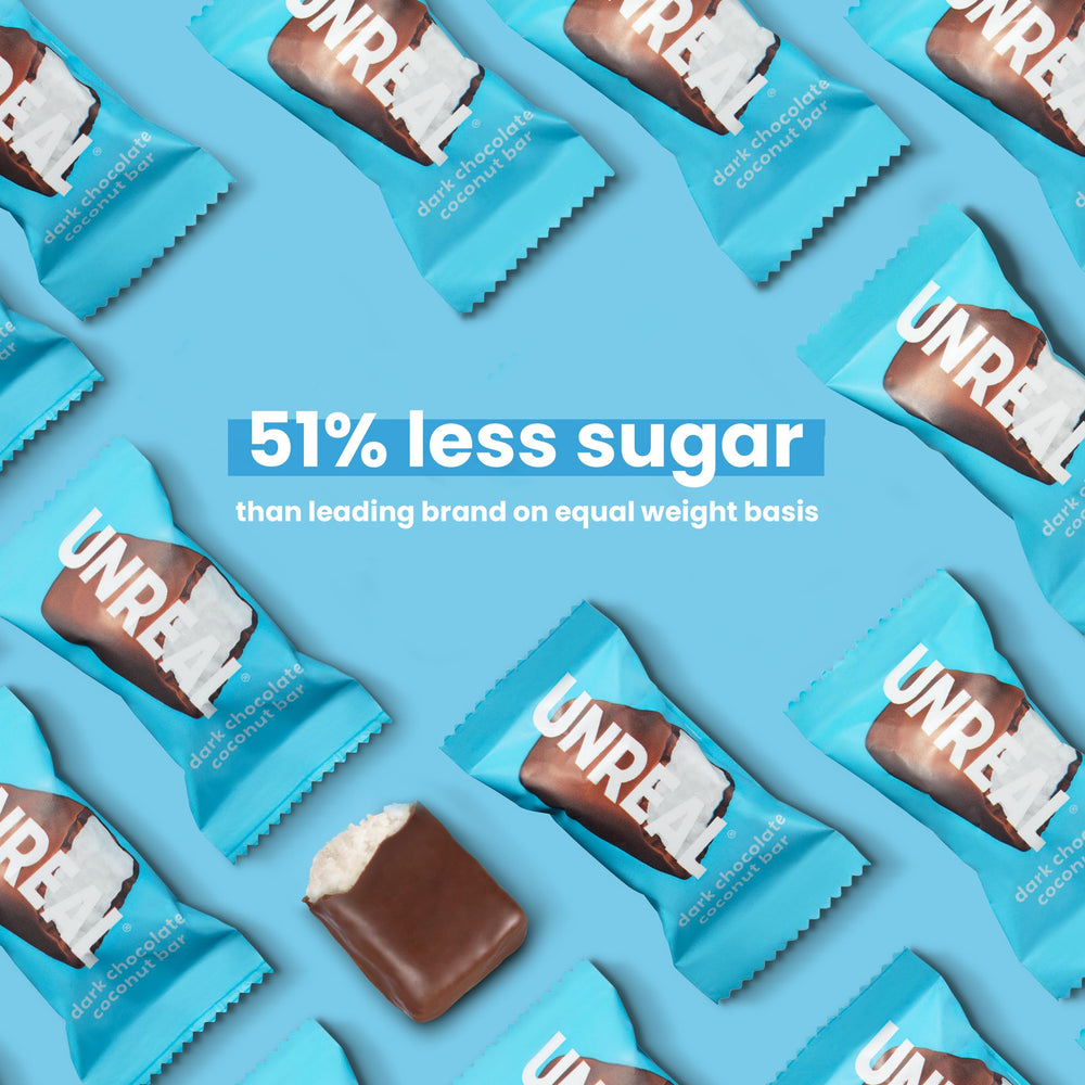 UNREAL Dark Chocolate Coconut Bars presented as vegan and gluten-free for mindful snacking.