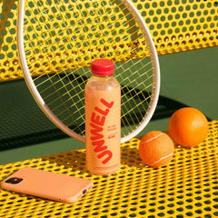 Unwell Hydration label close-up highlights natural flavors for clean taste