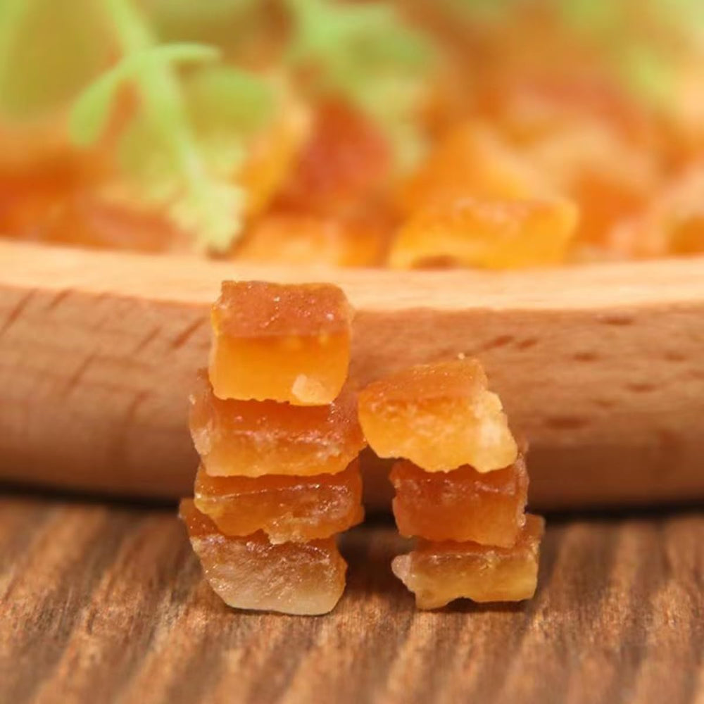UpBots candied orange peel ding close-up sparkles, elevating desserts with glamour