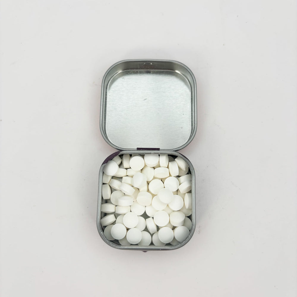 Gift-ready Nevermore Mints tin signals a thoughtful, witty literary gift.