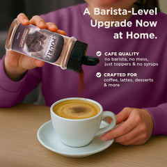 Upouria chocolate-flavored topping on coffee swirl highlights bold cocoa aroma.