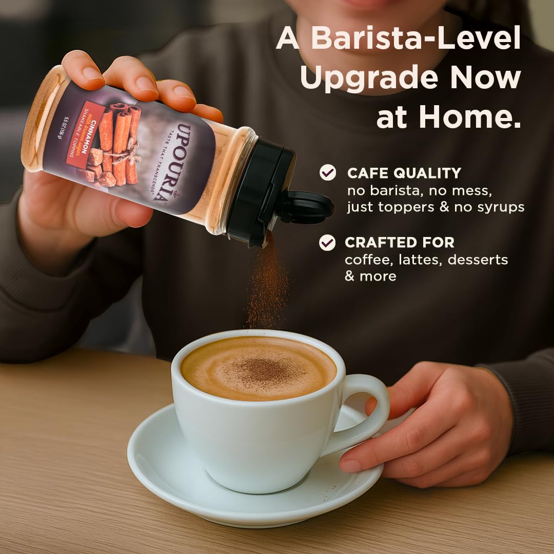 Upouria topping dusting a latte with golden brown sugar and spice