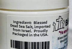 Urban ReLeaf Blessing Salt jar being mixed with water enables external anointing.