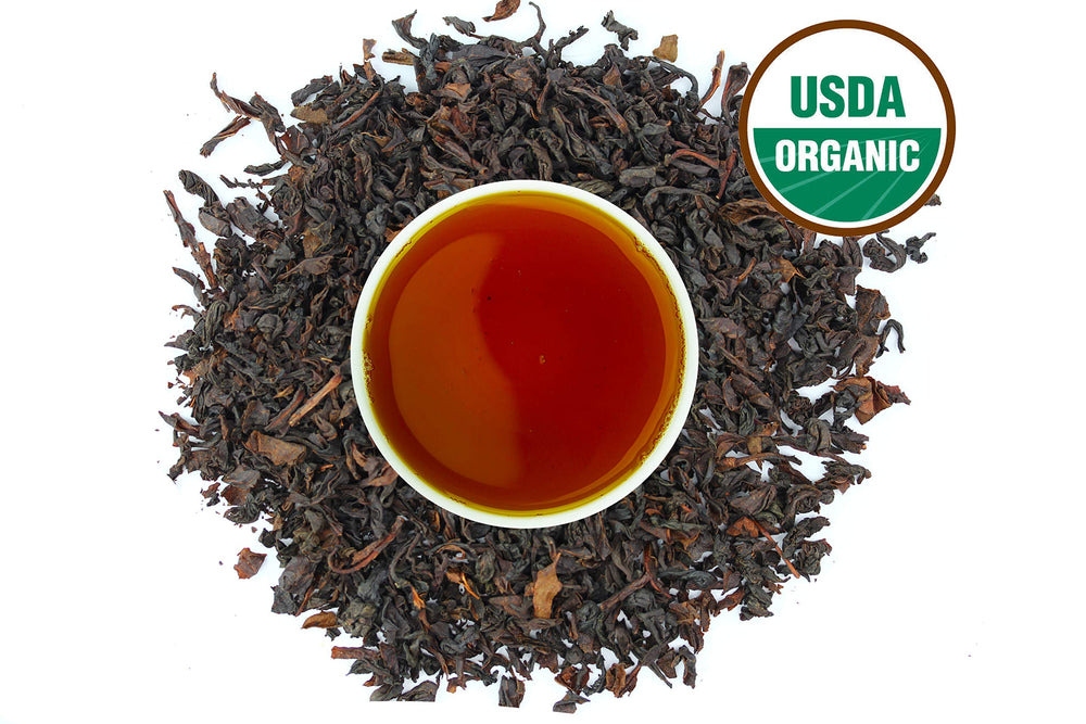 US Wellness Naturals Earl Grey loose leaf close-up highlighting bergamot aroma and quality leaves.