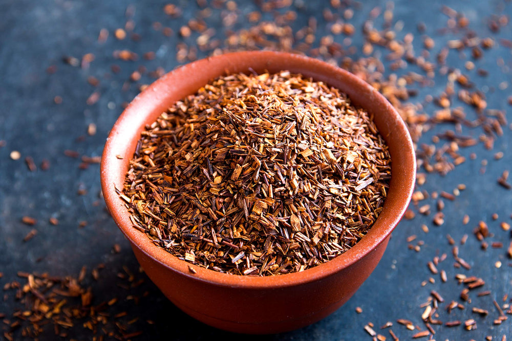 US Wellness Naturals Honeybush tea steeping in cup for a smooth, non-bitter infusion.